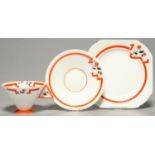 AN ART DECO SHELLEY BONE CHINA 'J' PATTERN TEACUP, SAUCER AND PLATE OF VOGUE SHAPE, C1930, PRINTED