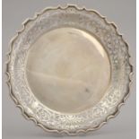 GOLFING INTEREST. A GEORGE V SILVER FRUIT DISH, WITH SAW-PIERCED PALMETTE BORDER AND SHAPED RIM,