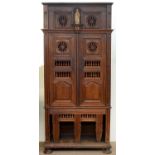 A SPANISH OAK AND WALNUT CUPBOARD, 19TH C, OF PANELLED CONSTRUCTION, THE OPEN SECTIONS WITH SPINDLES