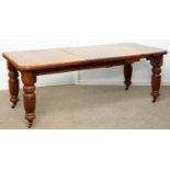 A VICTORIAN WALNUT DINING TABLE, C1890, ON BULBOUS TURNED AND REEDED LEGS ON POTTERY CASTORS, WITH A