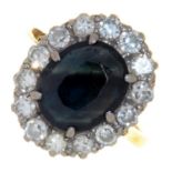 A SAPPHIRE AND DIAMOND CLUSTER RING IN GOLD, MARKED 18CT, 5.9G SIZE M½  Condition report  Hoop