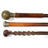 THREE VARIOUS HARDWOOD WALKING CANES, ONE WITH BULBOUS CAST BRASS POMMEL, 19TH/EARLY 20TH C, 84.