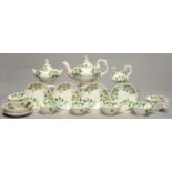A ZACHARIAH BOYLE TEA SERVICE C1840, PAINTED IN SHADES OF GREEN AND GILT WITH FOLIAGE, TEAPOT AND
