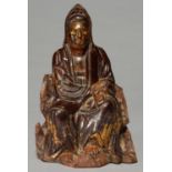 A SOUTH EAST ASIAN LACQUERED AND GILTWOOD SCULPTURE OF GUANYIN 18TH/19TH C, 25.5CM H Condition