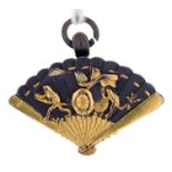 A JAPANESE SHIBUICHI AND GOLD FAN SHAPED FOB PENDANT, THE BACK INSET WITH A COMPASS, MEIJI PERIOD,