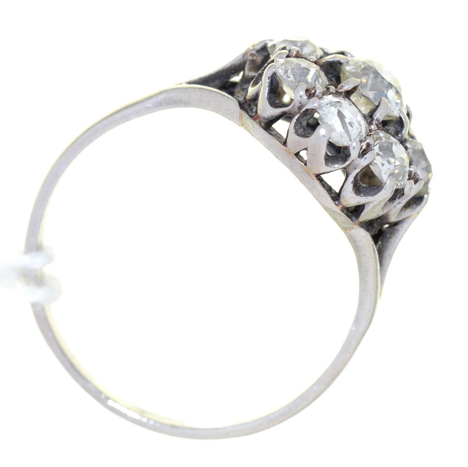 A DIAMOND CLUSTER RING, WITH NINE OLD CUT DIAMONDS, PLATINUM COLOURED METAL HOOP, MARKED WITH AN - Image 2 of 2