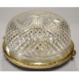 A ROUND CUT GLASS PLAFONNIER OR CEILING LIGHT, WITH HINGED CAST BRASS MOUNT, SECOND QUARTER 20TH