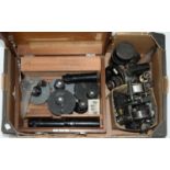 TWO LABORATORY MICROSCOPES BY TAYLOR, HOBSON LTD. OR WATSON & SONS, MID 20TH C, 74 AND 83CM H,