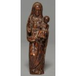 A STAINED IVORY MINIATURE SCULPTURE OF THE VIRGIN AND CHILD, MEDIEVAL STYLE, 19TH C, 13CM H
