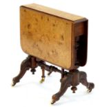 A VICTORIAN WALNUT SUTHERLAND TABLE, ON TURNED AND CARVED BASE, WITH POTTERY CASTORS AND QUARTER