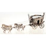 A NORTHERN EUROPEAN SILVER TOY OR MINIATURE MODEL OF AN 18TH C COACH AND FOUR HORSES, 15CM L,