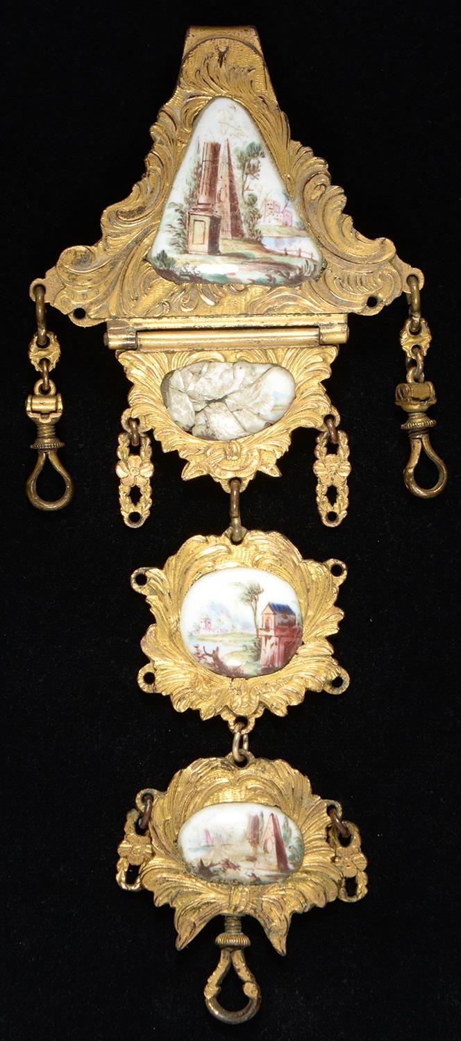 A PINCHBECK AND ENAMEL CHATELAINE HOOK, PROBABLY ENGLISH, C1770, WITH ENAMEL PLAQUES PAINTED WITH