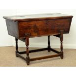 A GEORGE III ELM DOUGH BIN, C1800, THE BOARDED LID WITH MOULDED LIP, ON BALUSTER LEGS UNITED BY