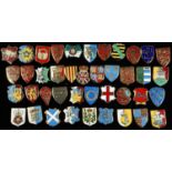 A SET OF FORTY ELIZABETH II SILVER OR SILVER GILT AND ENAMEL MINIATURE SHIELDS OF ARMS OR HERALDIC