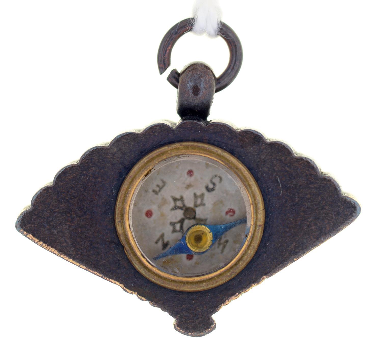 A JAPANESE SHIBUICHI AND GOLD FAN SHAPED FOB PENDANT, THE BACK INSET WITH A COMPASS, MEIJI PERIOD, - Image 2 of 2