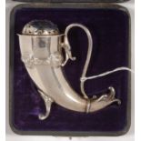 AN EDWARD VII SILVER SUGAR CASTER AND COVER IN THE FORM OF A CELTIC DRINKING HORN WITH GROTESQUE