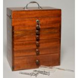 MEDICAL. A TEAK SURGICAL OPERATION CABINET, EARLY 20TH C, THE LIDDED COMPARTMENT ABOVE SIX GRADUATED