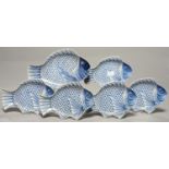 A SET OF SIX JAPANESE BLUE AND WHITE FISH SHAPED DISHES, 20TH C, 31CM L AND SMALLER, APOCRYPHAL