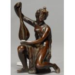 A RENAISSANCE STYLE MINIATURE BRONZE STATUETTE OF A MUSICIAN, 19TH C, RICH BROWN PATINA, RUBBED OR