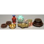 FOUR VARIOUS CHINESE WOOD STANDS, A CINNABAR LACQUER VASE, 20TH C, A 19TH C DECORATIVE CAST BRASS