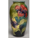 A MORCROFT HIBISCUS VASE, 25CM H, IMPRESSED MARKS, PAINTED INITIALS Condition report  Good
