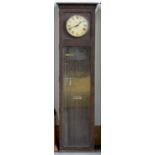 A MAGNETA OAK ELECTRIC WALL TIMEPIECE, EARLY 20TH C WITH GLAZED DOOR, 137CM H, PENDULUM Condition