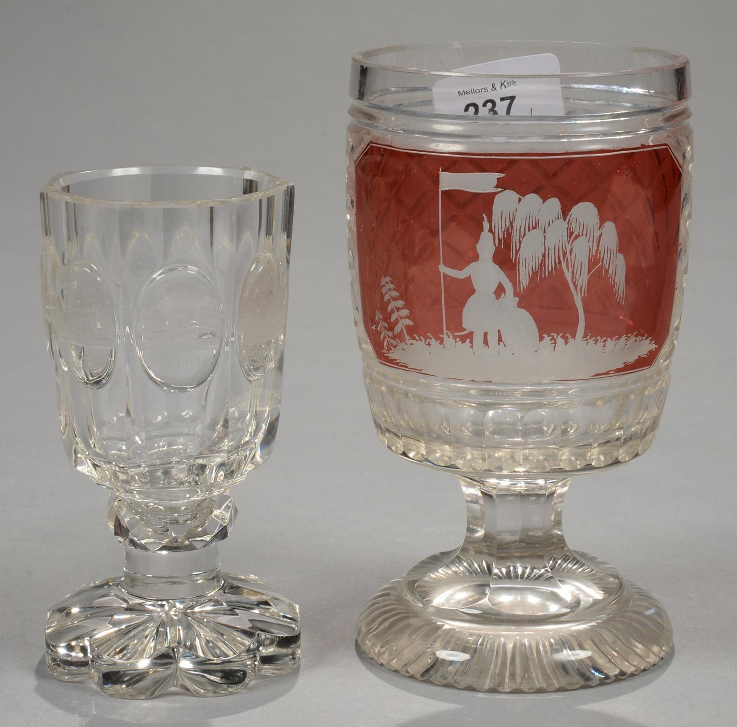 A BOHEMIAN RUBY FLASHED AND CUT GLASS GOBLET, 19TH C, THE PANEL TO THE FRONT ENGRAVED WITH A MAN