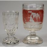 A BOHEMIAN RUBY FLASHED AND CUT GLASS GOBLET, 19TH C, THE PANEL TO THE FRONT ENGRAVED WITH A MAN