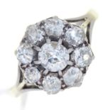 A DIAMOND CLUSTER RING, WITH NINE OLD CUT DIAMONDS, PLATINUM COLOURED METAL HOOP, MARKED WITH AN