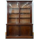 A VICTORIAN MAHOGANY BOOKCASE, THE UPPER PART WITH CAVETTO CORNICE AND FITTED WITH ADJUSTABLE