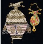 A CUT STEEL, GILTMETAL AND KNITTED WOOL PURSE (RETICULE), MID 19TH C, 13CM OVERALL AND ANOTHER