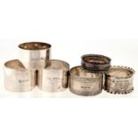 SIX SILVER NAPKIN RINGS, BY VARIOUS BRITISH MAKERS, EARLY 20TH C, 5 OZ 12 DWT Condition report  Good