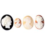 A WHITE HARDSTONE CAMEO OF THE HEAD OF A YOUNG WOMAN, MOUNTED ON BLACK GLASS, 19TH C, 42MM, LATER