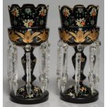 A PAIR OF ENAMELLED BLACK GLASS LUSTERS, LATE 19TH C, THE BOWLS WITH RAISED GILT STYLISED FOLIAGE,