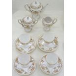 A JAPANESE GLAZED PORCELAIN AND RAISED GILT VASE SHAPED TEA SERVICE, EARLY 20TH C, TEAPOT AND