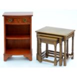 AN OAK NEST OF TABLES, 48CM H; 51 X 35CM AND A BOW FRONTED BEDSIDE CABINET Condition report  Both in