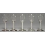 FIVE SIMILAR WINE GLASSES, 19TH/EARLY 20TH C, THE ROUNDED FUNNEL BOWL ON DOUBLE SERIES OPAQUE