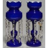 A PAIR OF BOHEMIAN OVERLAY GLASS LUSTERS, LATE 19TH C, OF OPAL CASED IN ROYAL BLUE GLASS AND HUNG