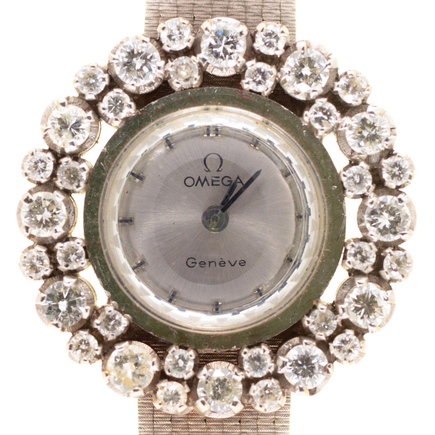 AN OMEGA 18CT WHITE GOLD COCKTAIL WATCH WITH DIAMOND BEZEL, 26MM DIAM, 41.6G Condition report  Lacks
