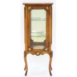 A FRENCH GILTMETAL MOUNTED WALNUT AND STAINED CABINET, 20TH C, IN LOUIS XV STYLE, APPLIED WITH