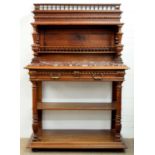 A FRENCH WALNUT BUFFET, C1900, WITH LANGUEDOC MARBLE SLAB, PANELLED BACK, GALLERIED SHELF AND TURNED