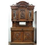 A NORTHERN FRENCH BUFFET, C1880, THE SUPERSTRUCTURE CARVED WITH A VENUS SHELL AND DOLPHINS, ENCLOSED