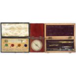 A SET OF SPIRIT SAFETY TESTERS, LATE 19TH C, COMPRISING FOUR GLASS AMPOULES OF RED, GREEN, AMBER