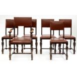 A SET OF SIX OAK DINING CHAIRS, INCLUDING AN ELBOW CHAIR, IN CLOSE NAILED UPHOLSTERY Condition