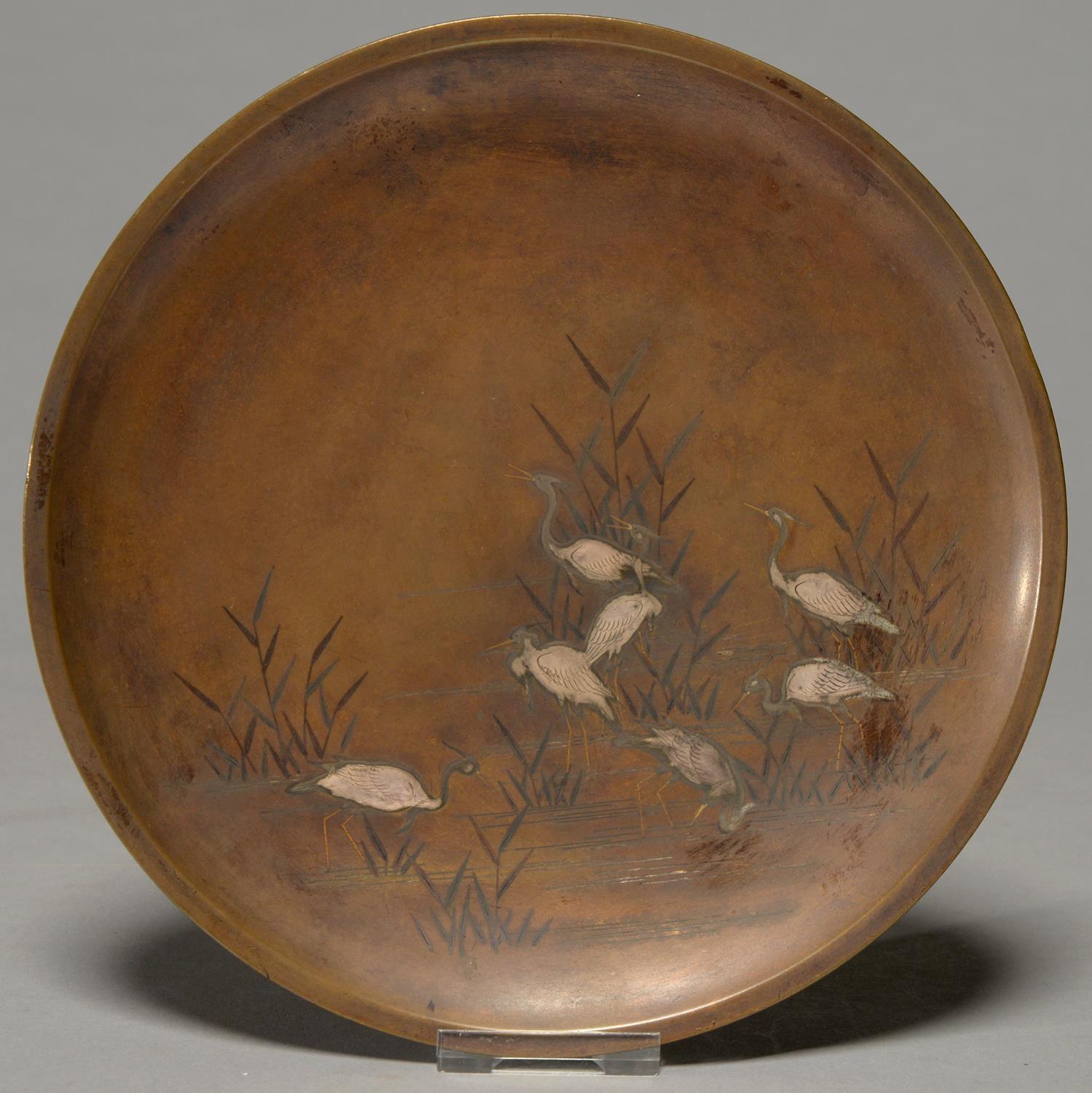 A JAPANESE INLAID BRONZE DISH, MEIJI PERIOD, FINELY DECORATED IN SILVER, GOLD AND SHIBUICHI WITH