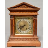 A GERMAN ARCHITECTURAL OAK BRACKET CLOCK, C1900, THE SQUARE BRASS DIAL WITH MATTED CENTRE,