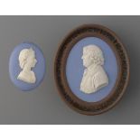 A WEDGWOOD SOLID JASPER COMMEMORATIVE PORTRAIT MEDALLION OF H M THE QUEEN BY ERIC OWEN, DATED