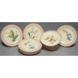 A COPELAND MOULDED EARTHENWARE DESSERT SERVICE, PRINTED AND PAINTED WITH BOTANICAL PLANTS IN RUST