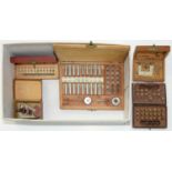 A BERGEON TAPS AND DIES SET, 0.75MM-1.20MM, MAKER'S FITTED WOOD BOX, TWO OTHERS BY THE SAME AND A