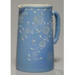 A WEDGWOOD BLUE JASPER DIP JUG, DECORATED BY HARRY BARNARD, C1898, 15.5CM, IMPRESSED MARK, INCISED